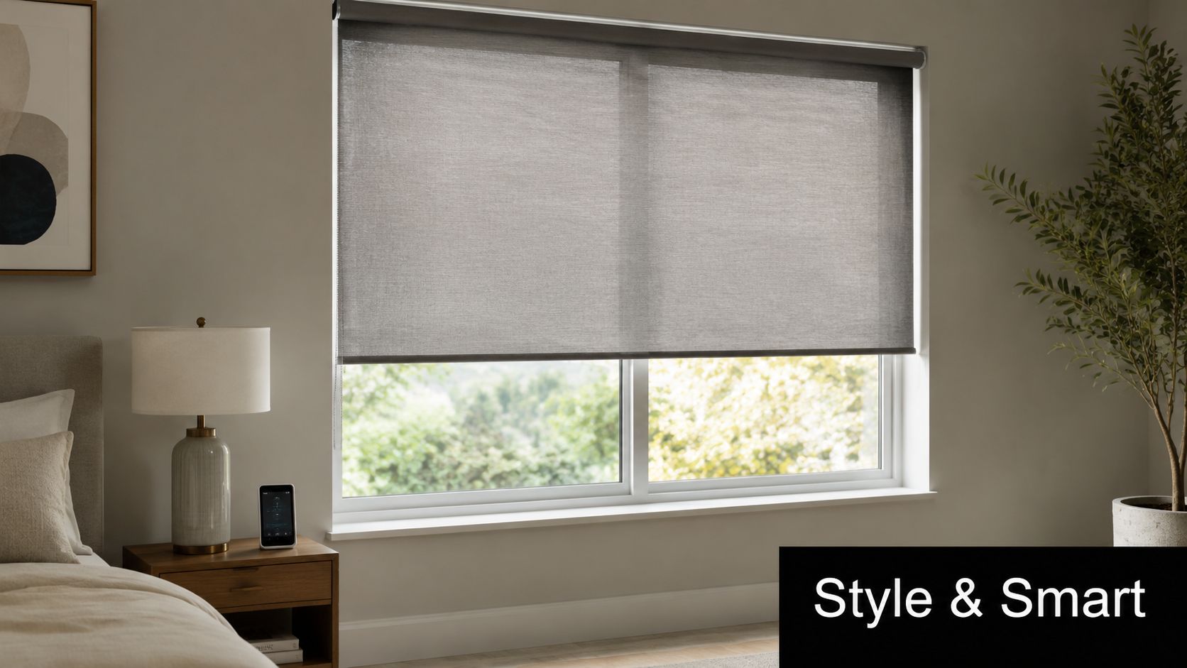 A modern bedroom with grey roller shades on a large window beside a lamp and potted plant.